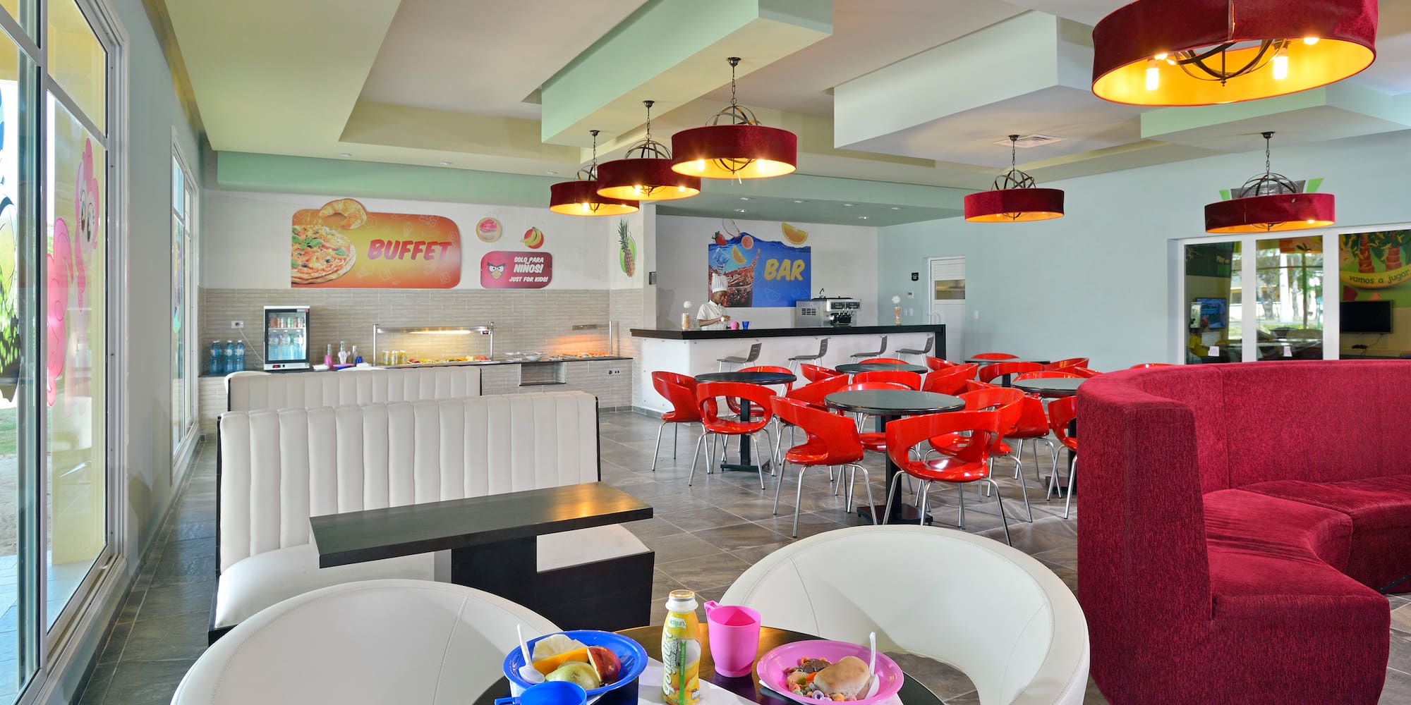 a room with tables and chairs