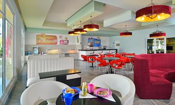 a room with tables and chairs