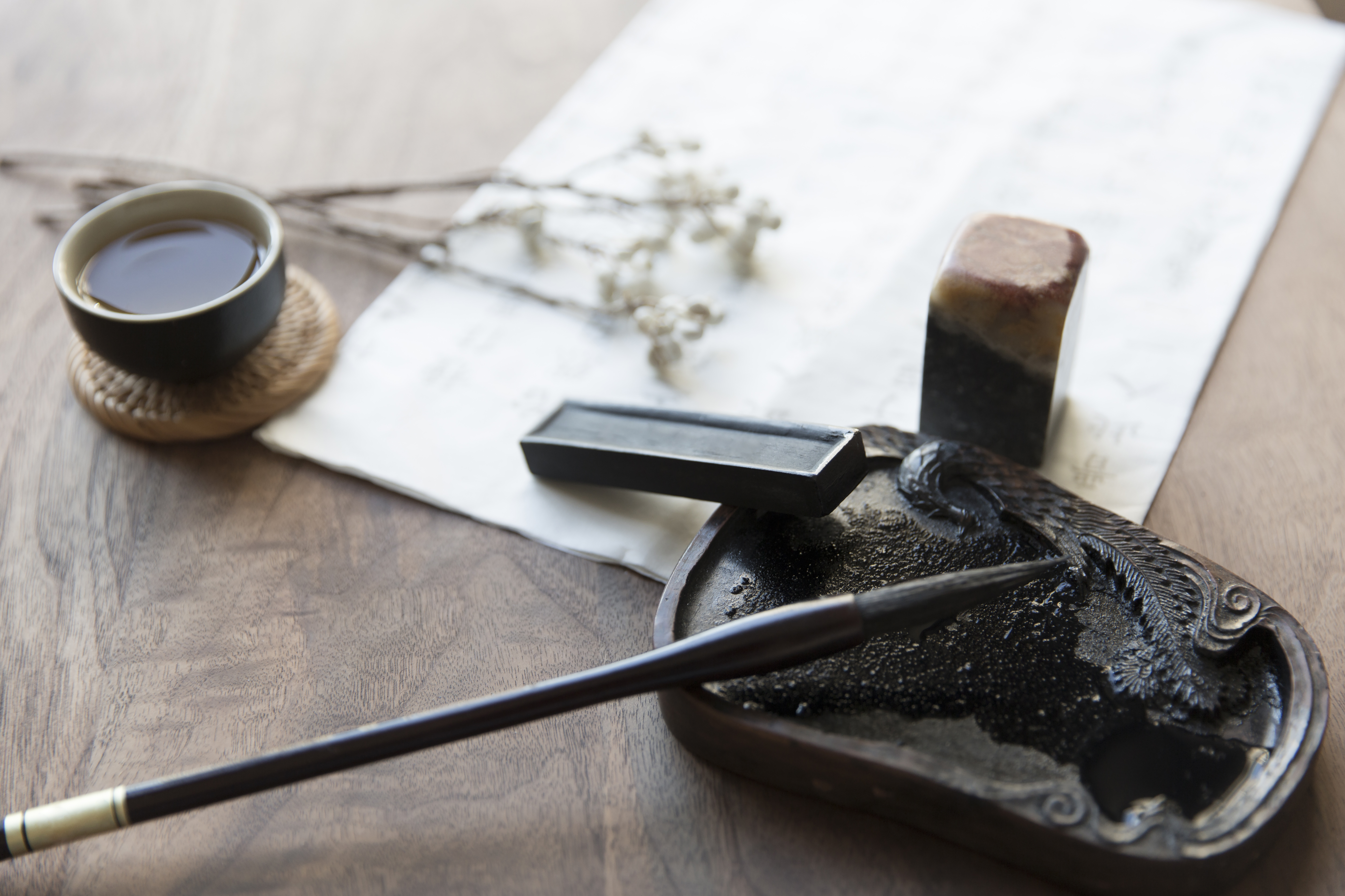 a pen and ink pen on a table