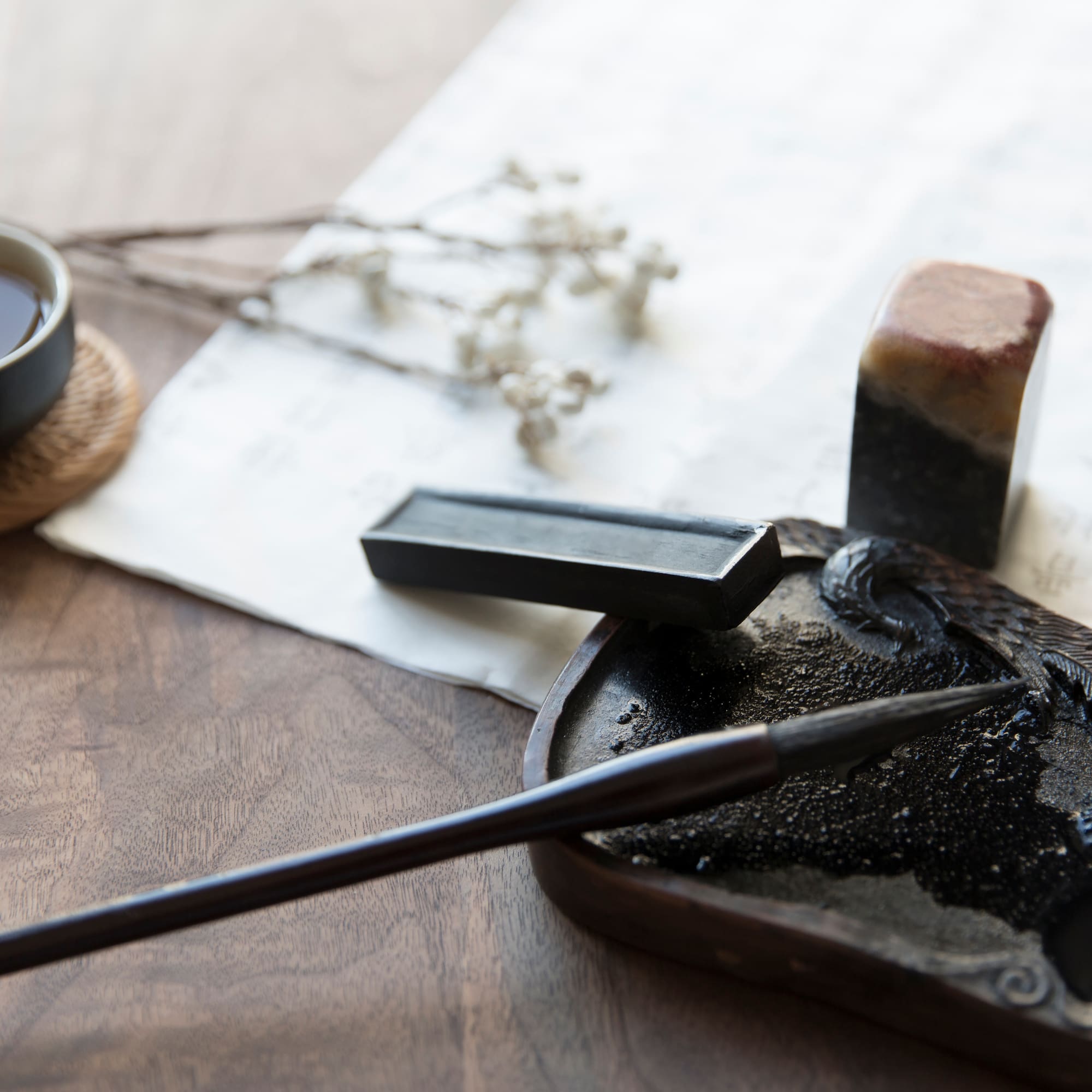 a pen and ink pen on a table