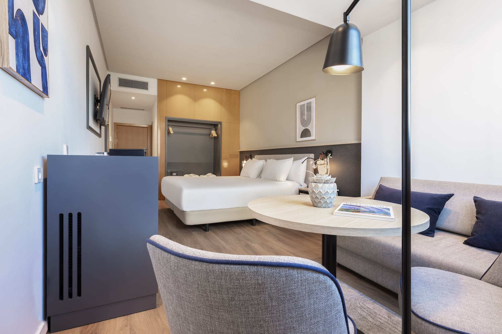 a room with a bed and a table