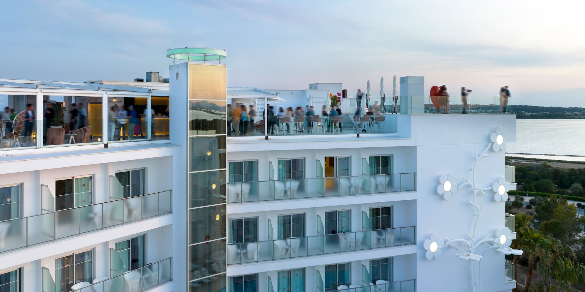 a group of people on a rooftop of a building