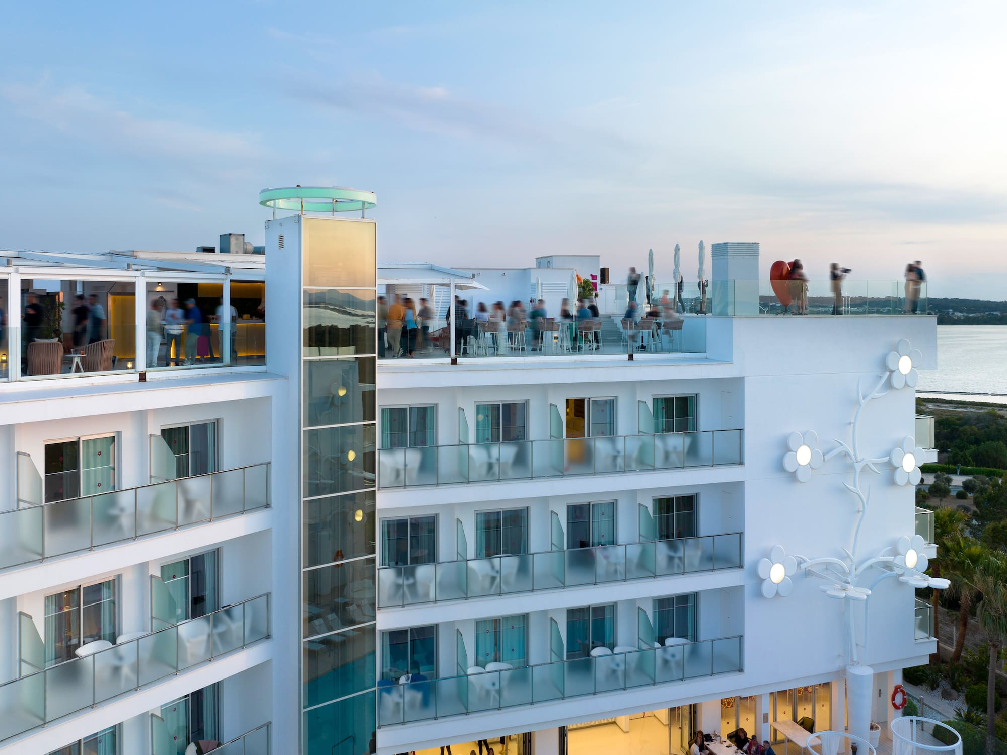 a group of people on a rooftop of a building