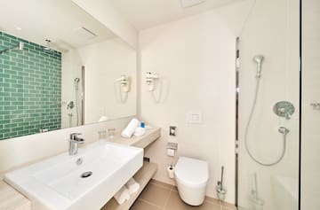 a bathroom with a sink and a shower