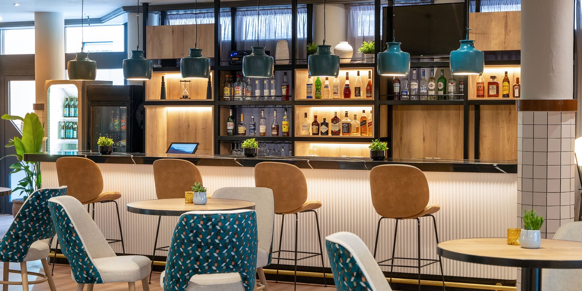 a bar with chairs and tables