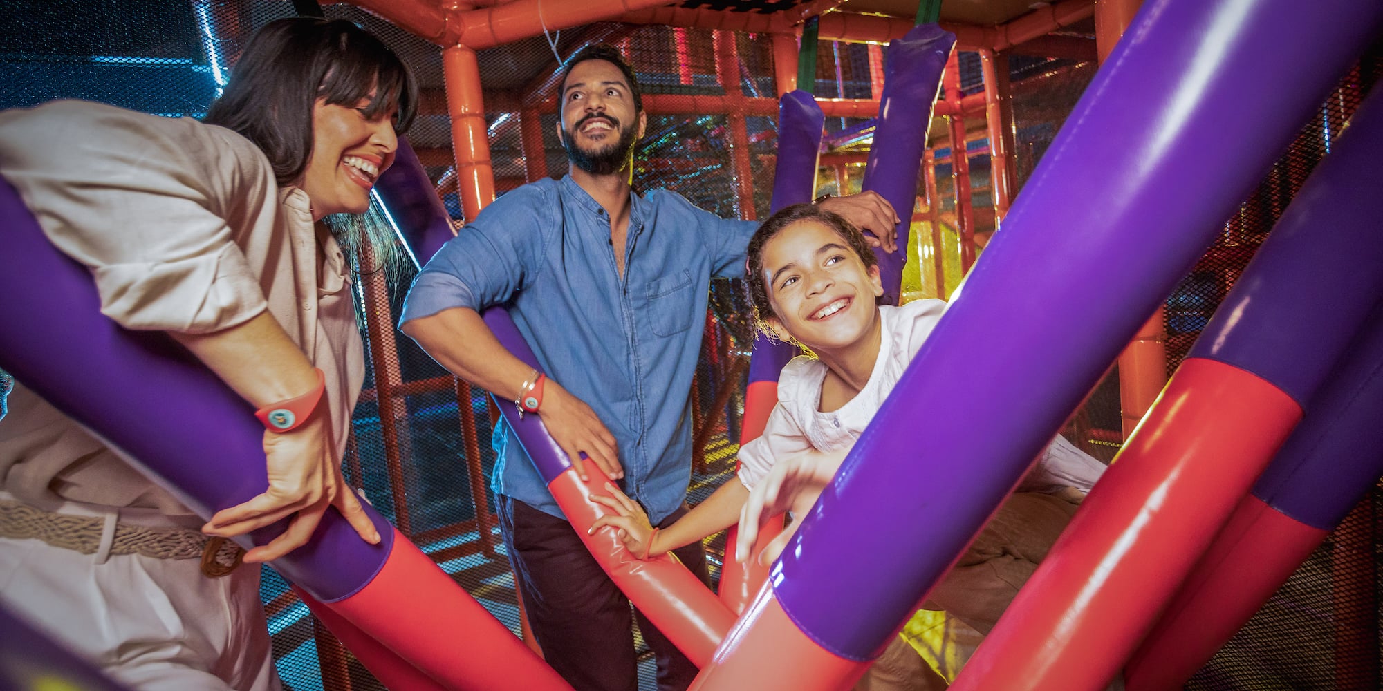 a group of people in a play area