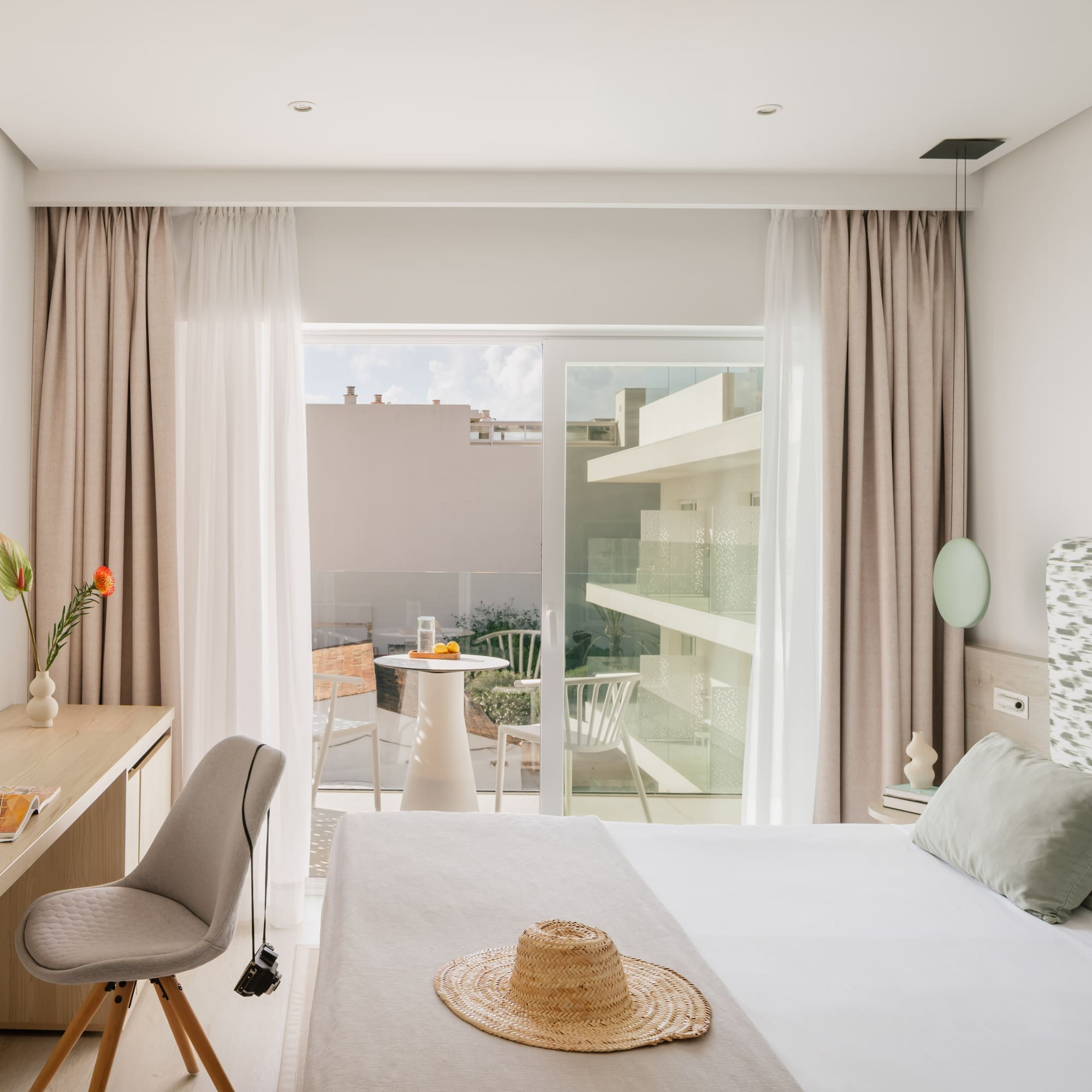 a bedroom with a bed and a desk