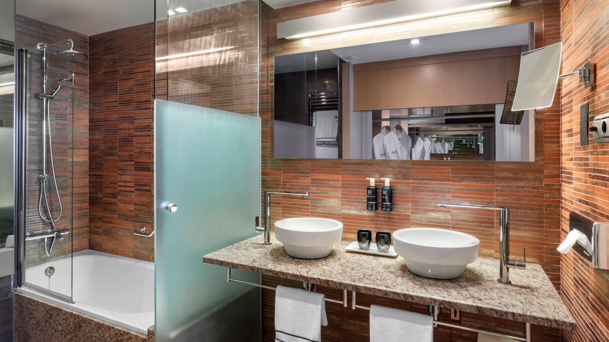 a bathroom with a shower and sink