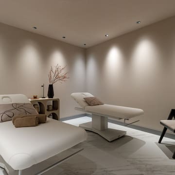 a room with chairs and a table