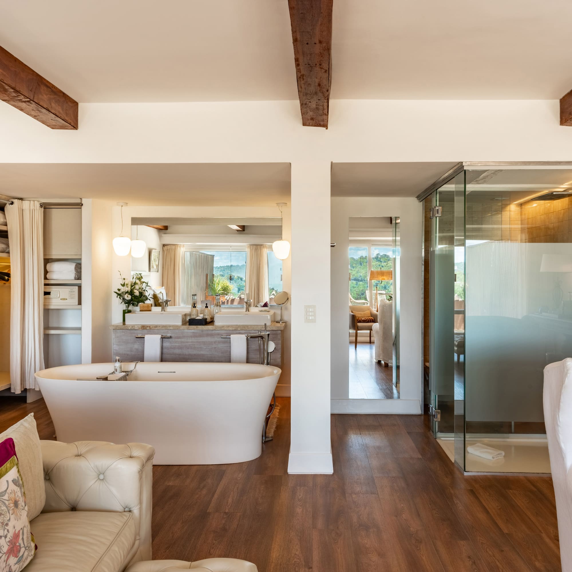 a room with a tub and a shower