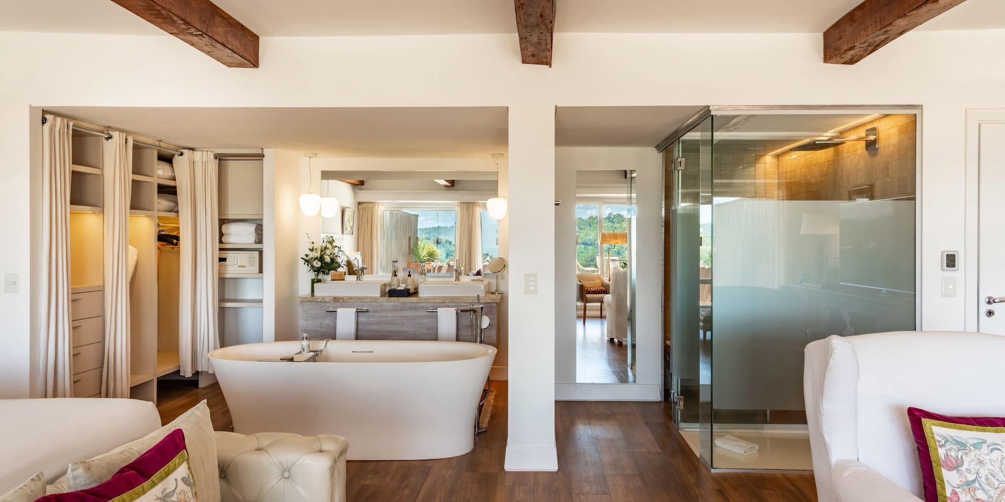 a room with a tub and a shower