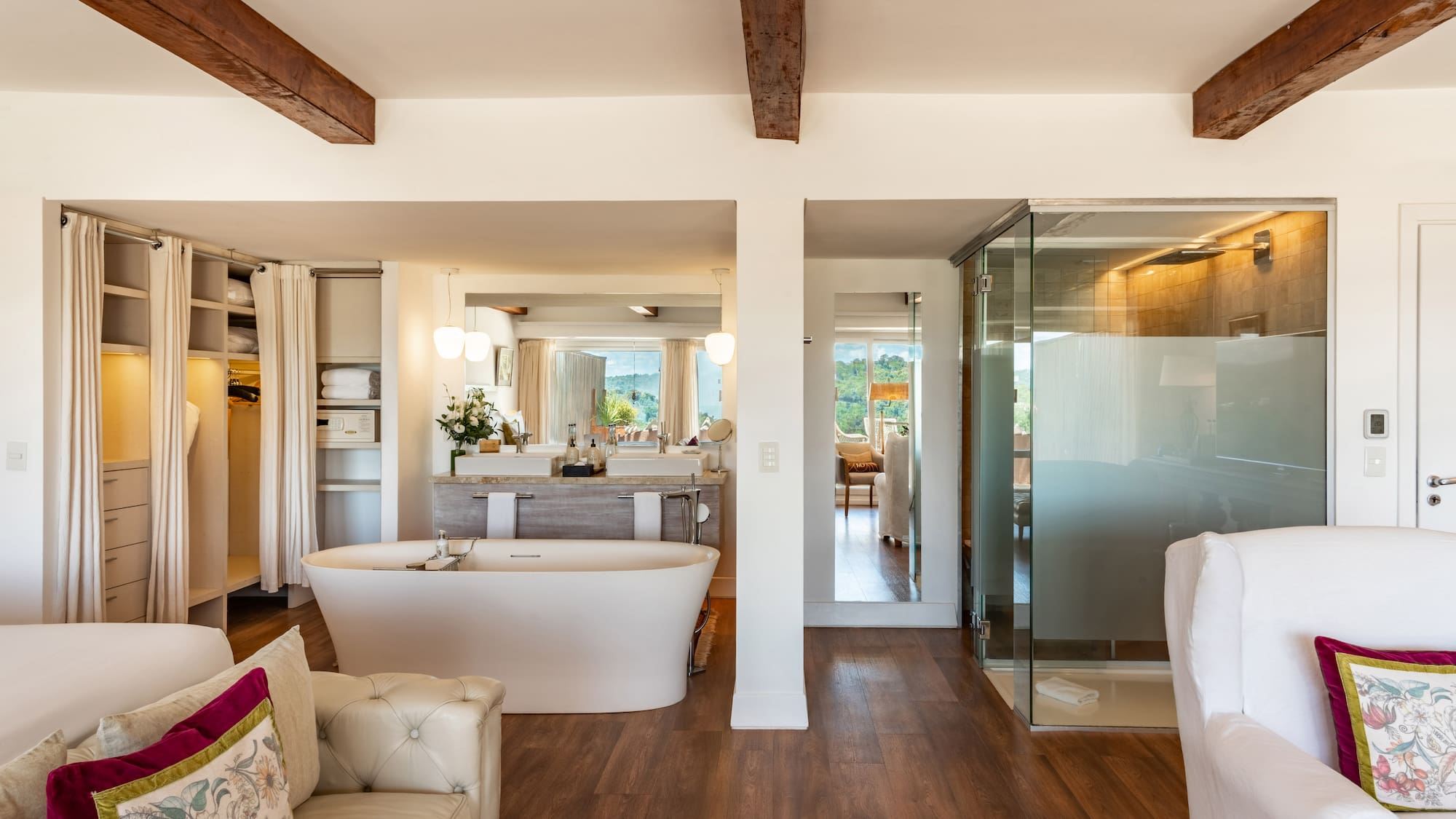 a room with a tub and a shower