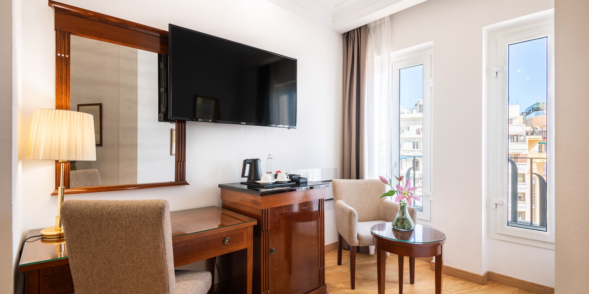 a room with a television and a table