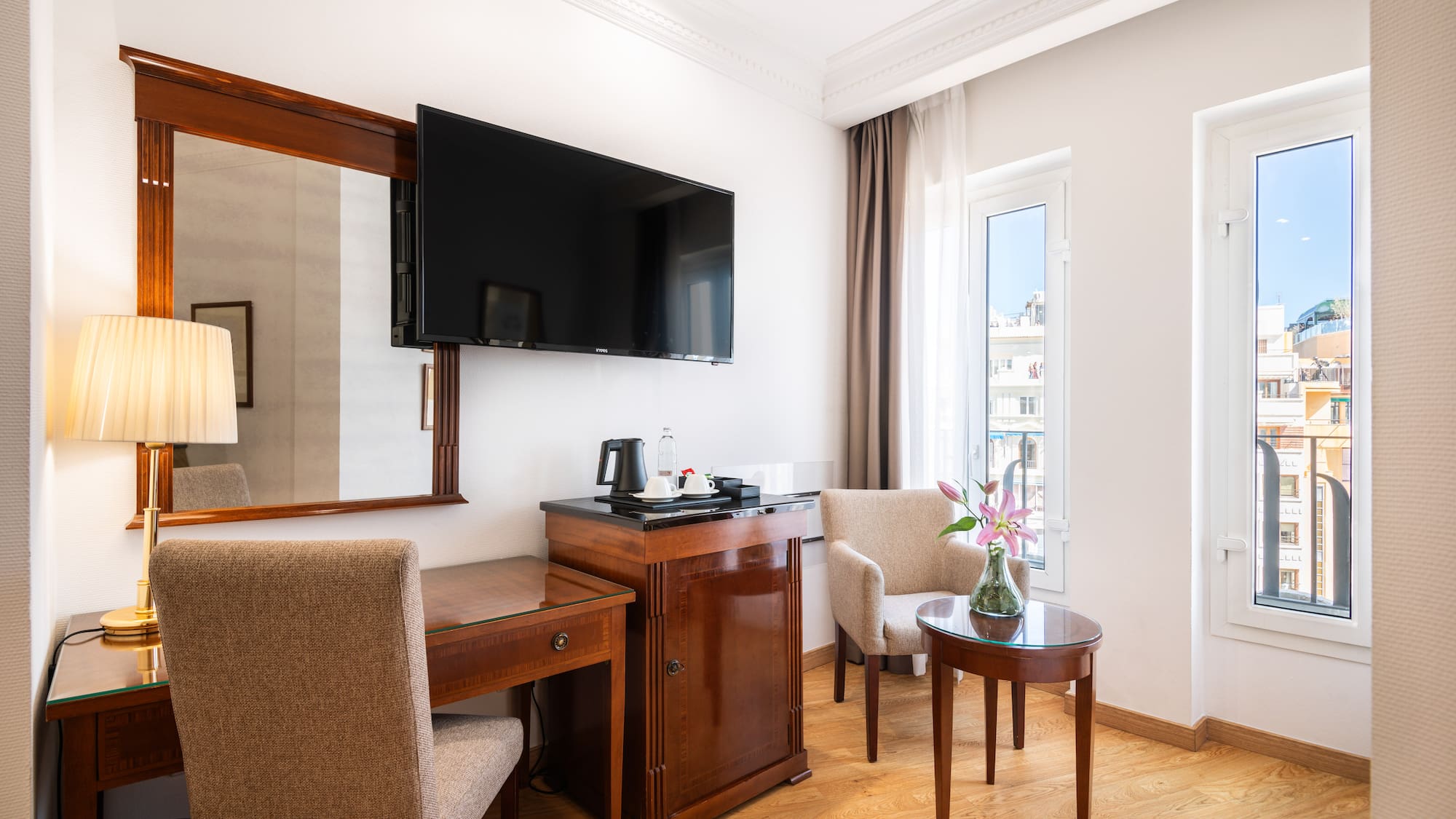 a room with a television and a table