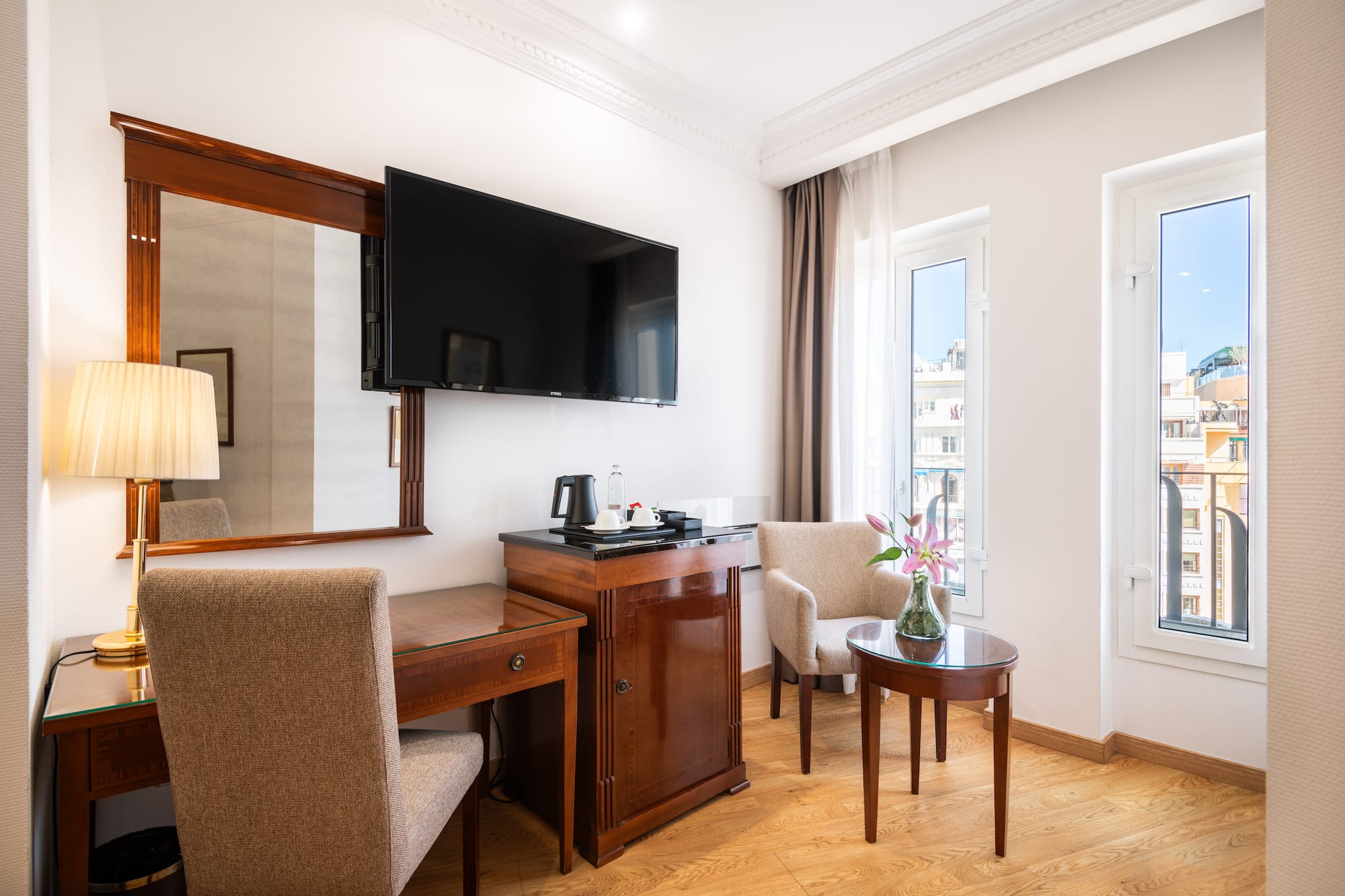 a room with a television and a table