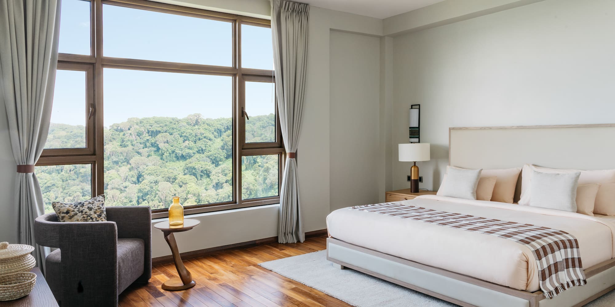 a bedroom with a large window