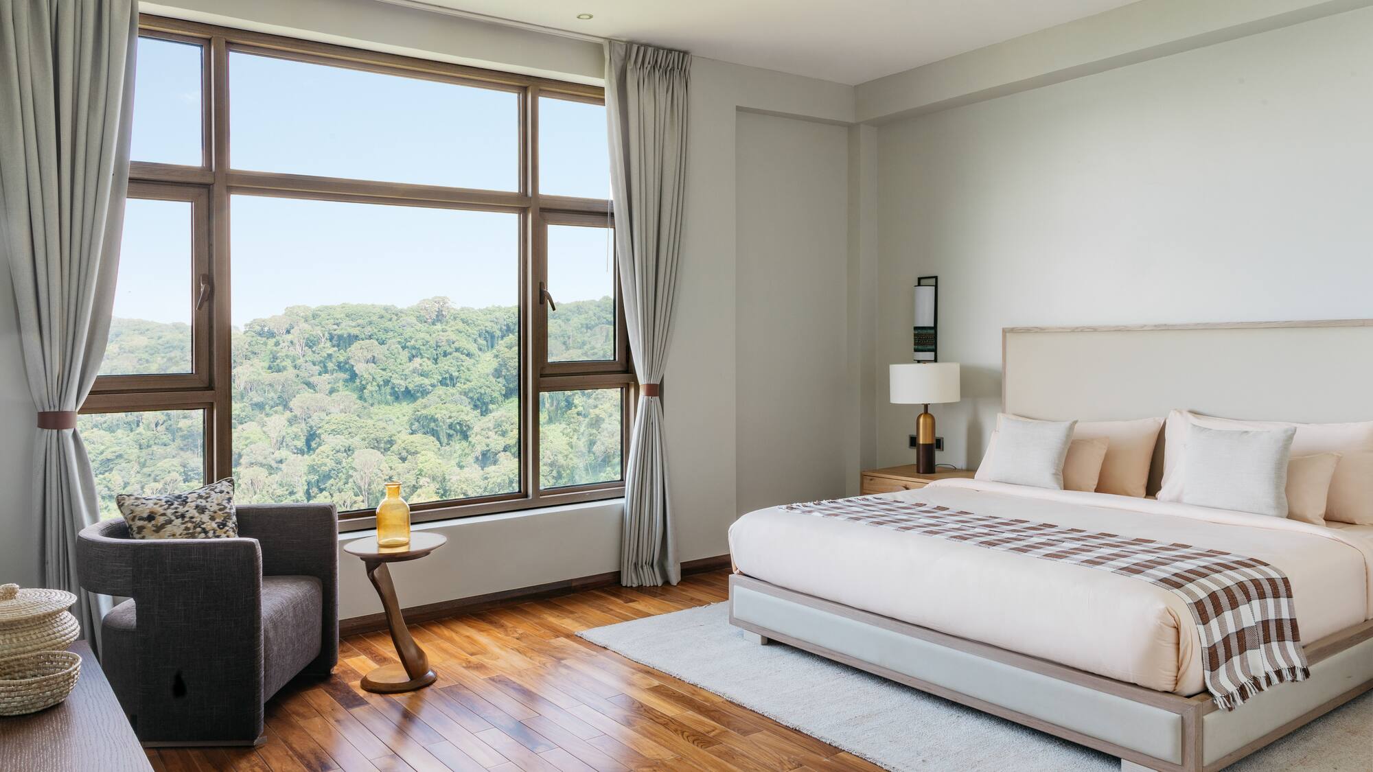 a bedroom with a large window