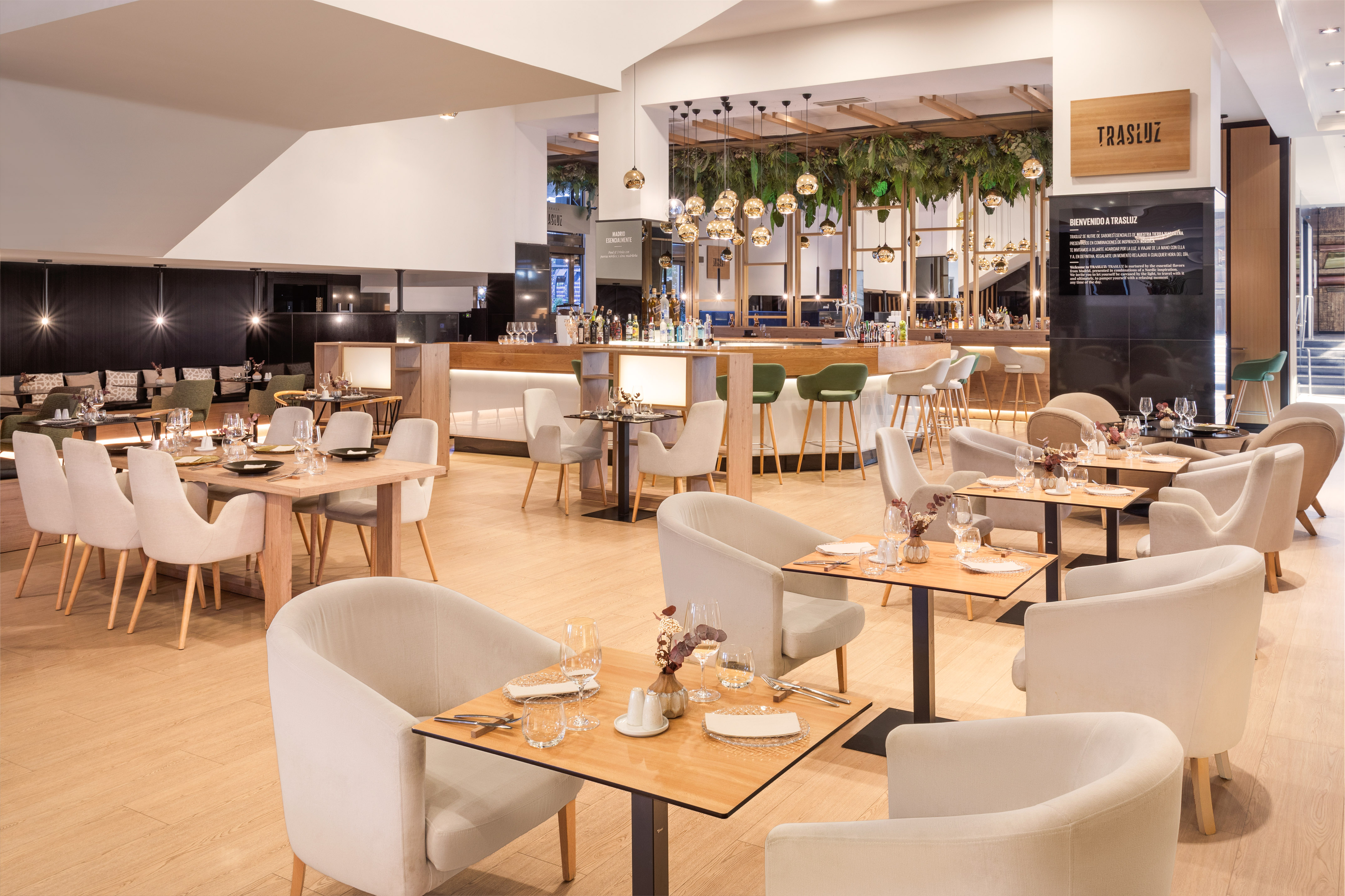 TRASLUZ restaurant: modern dining area, bar, stylish decor.