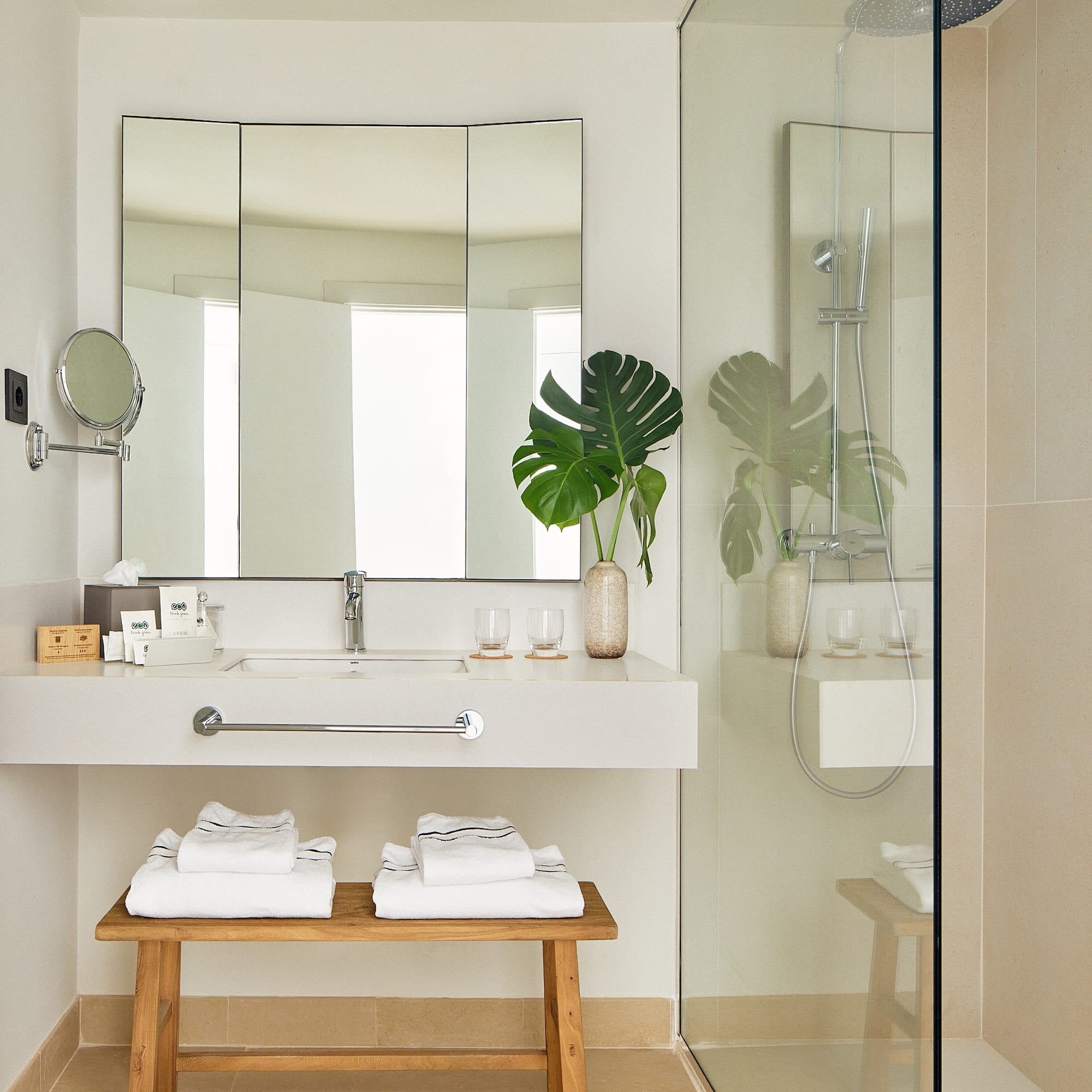 a bathroom with a mirror and a sink