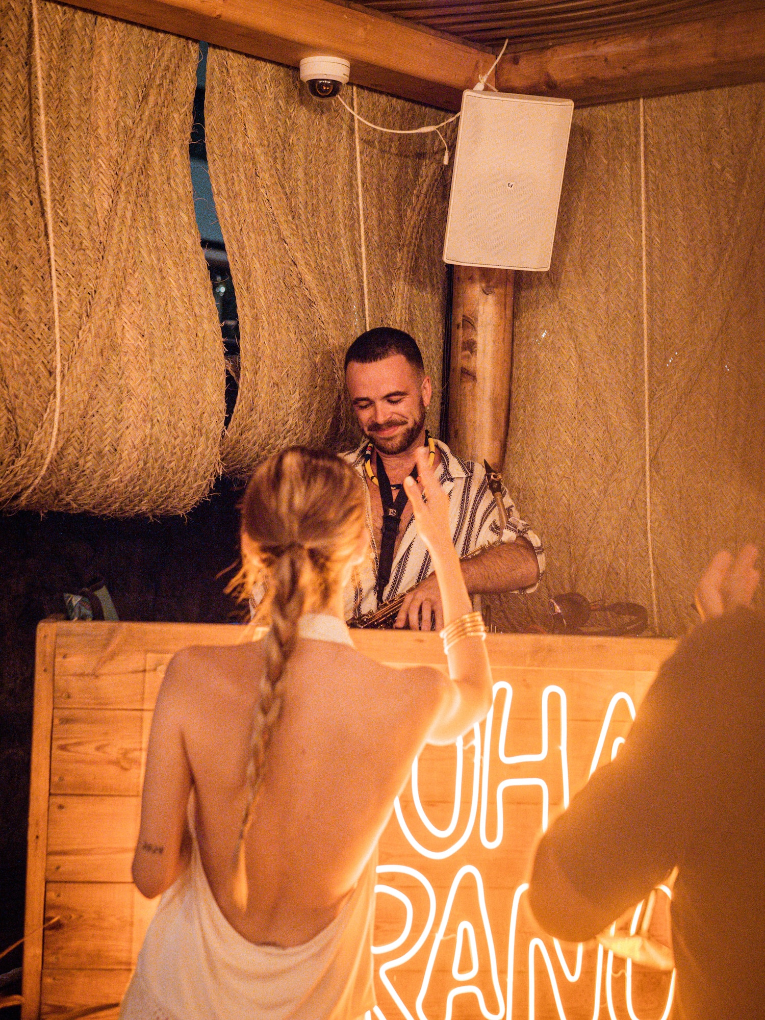 a man in a white dress