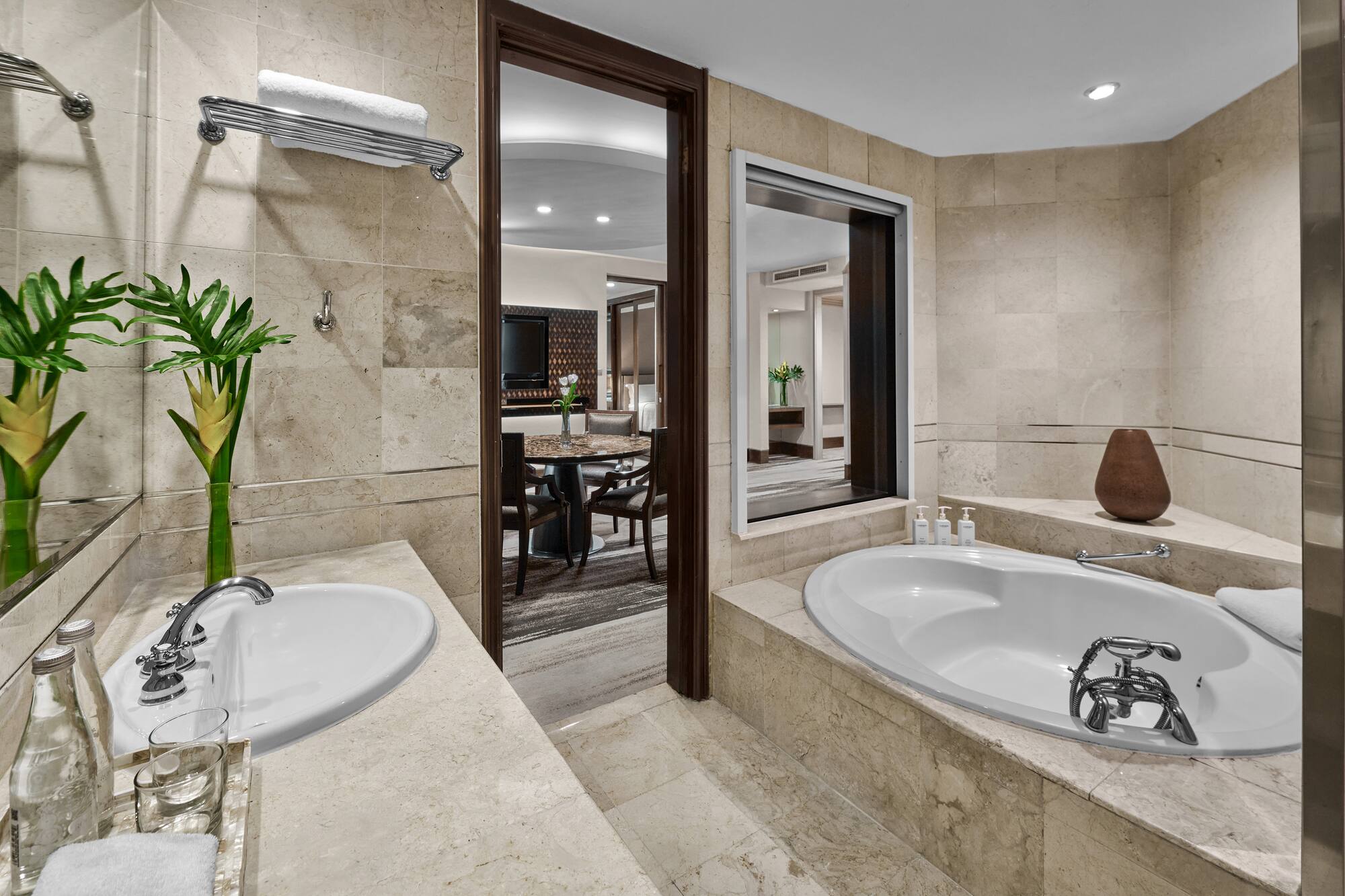 a bathroom with a tub and sink