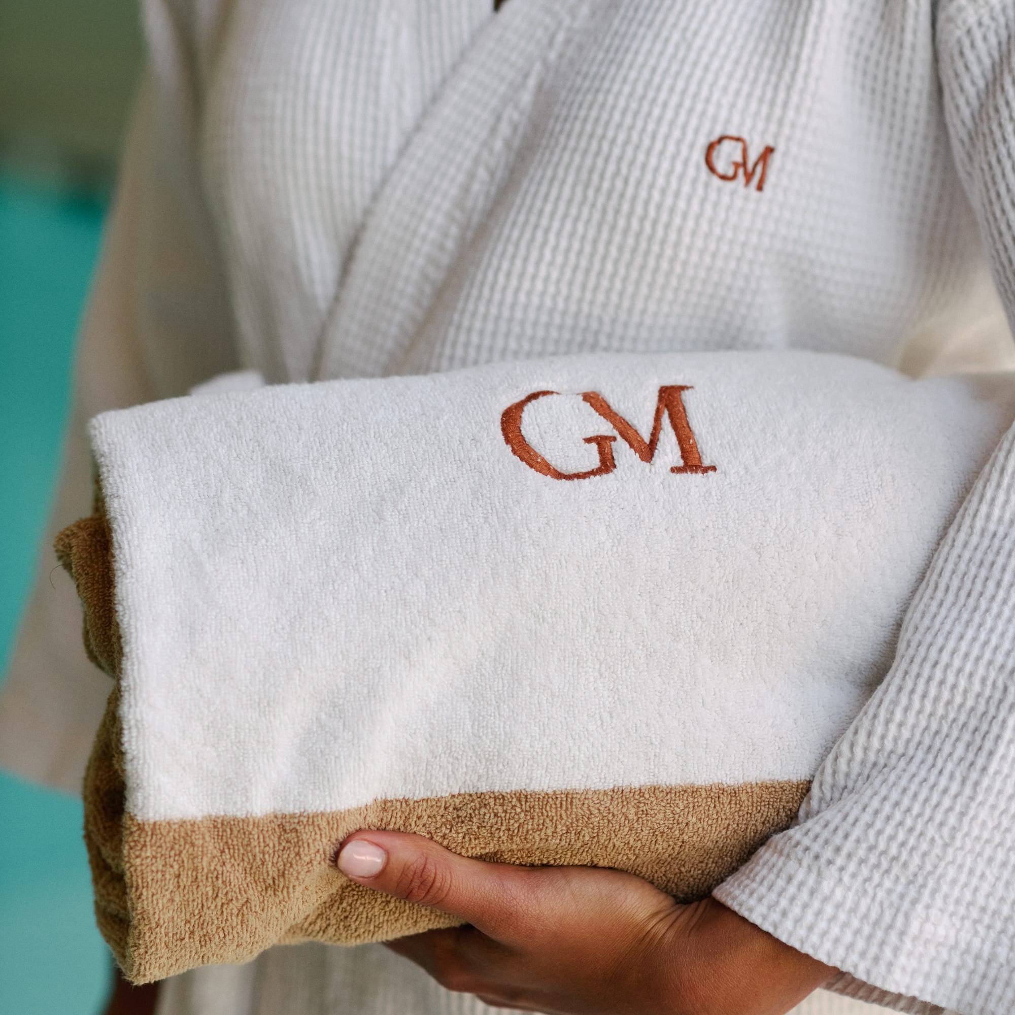 a person holding a towel