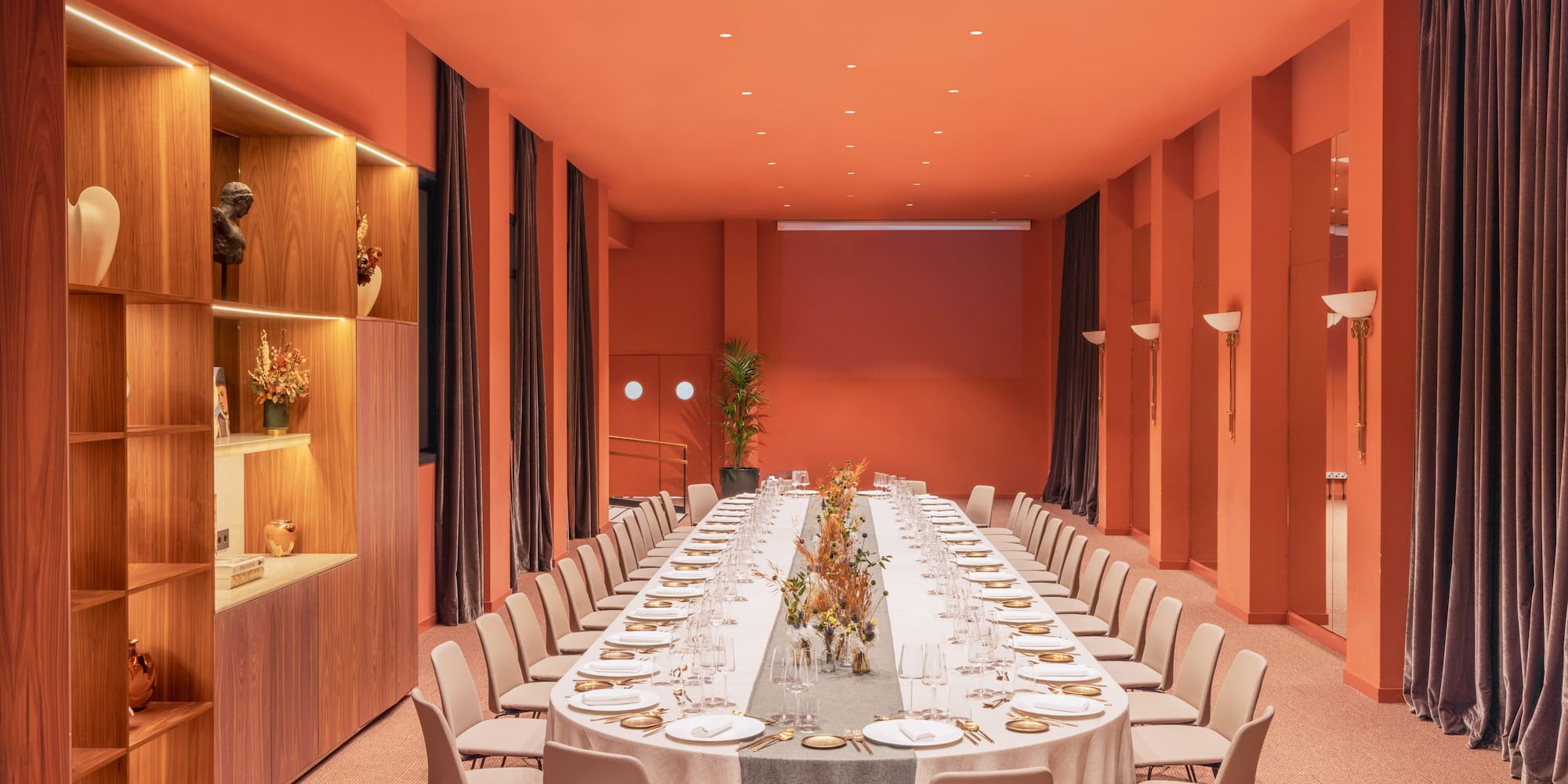 a long table set for a formal event