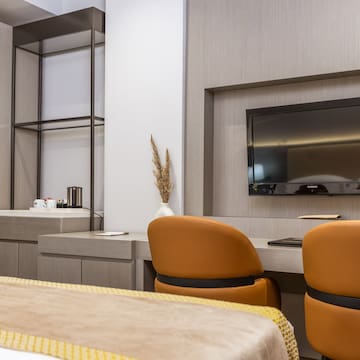 a room with a tv and a table