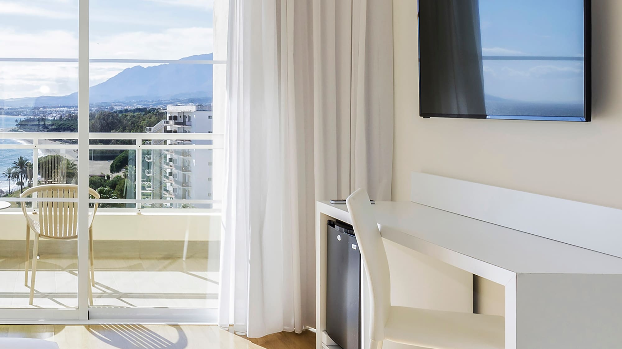 a room with a television and a table