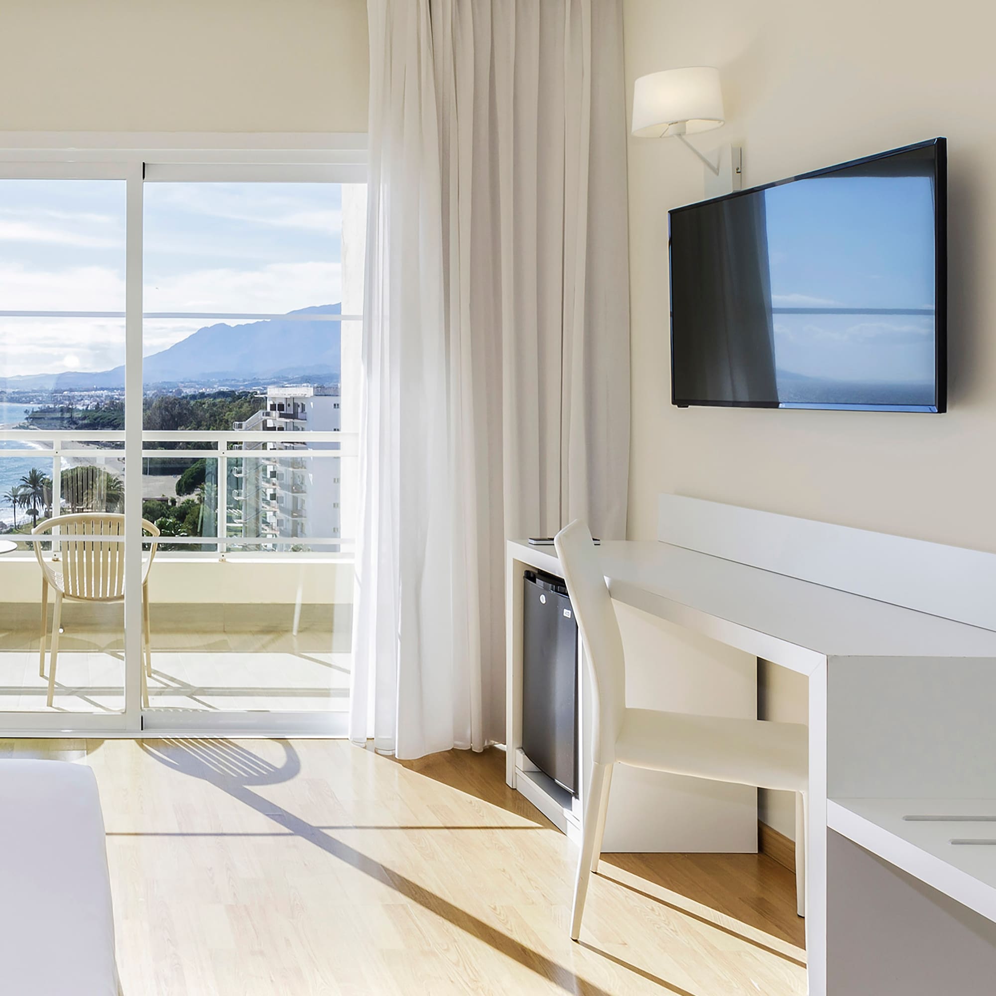 a room with a television and a table