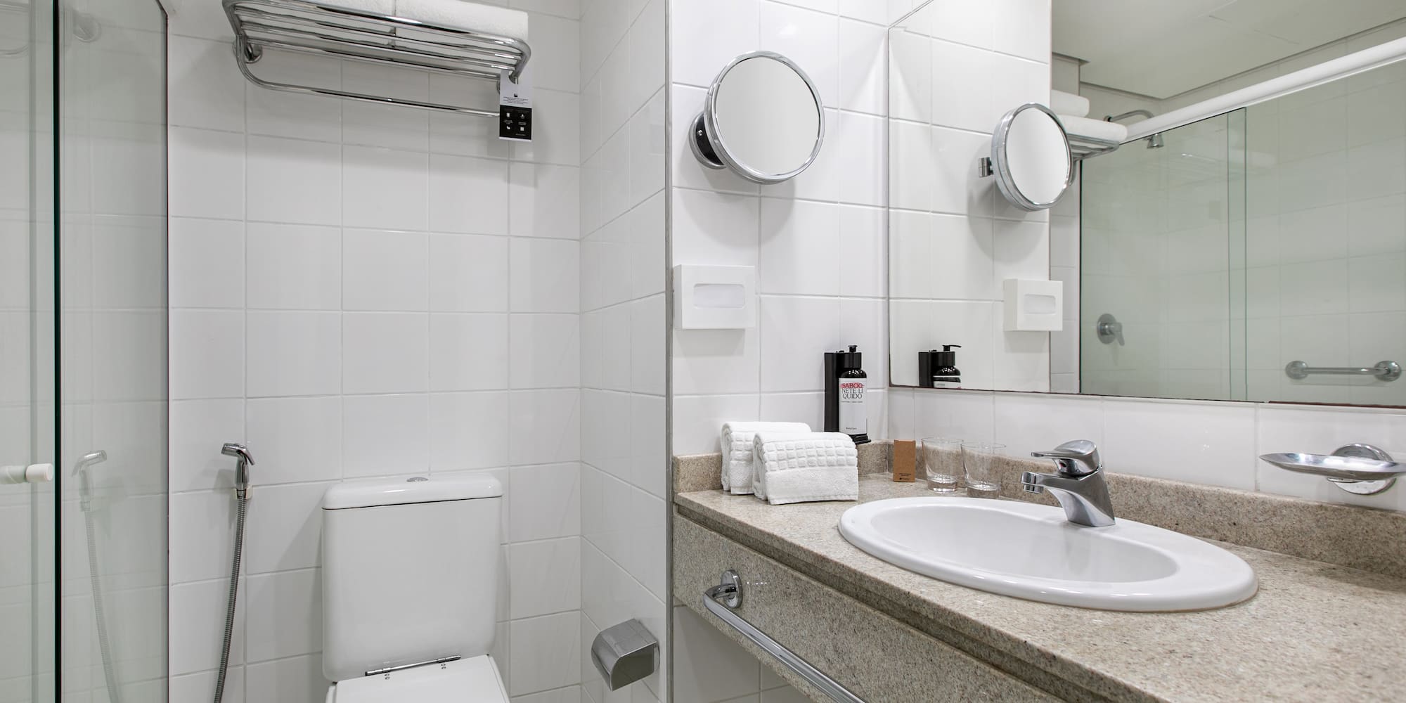 a bathroom with a sink and mirror