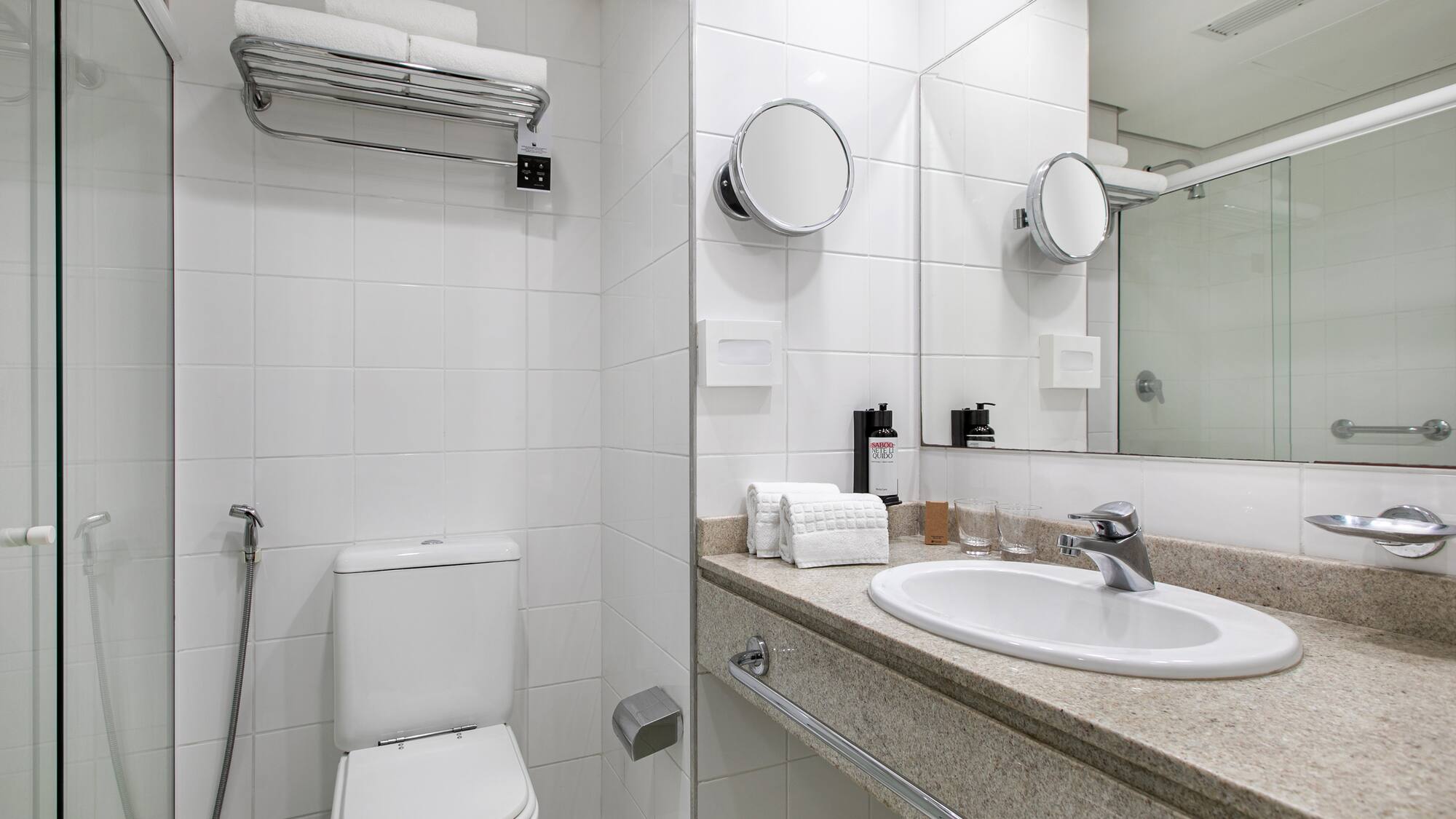 a bathroom with a sink and mirror