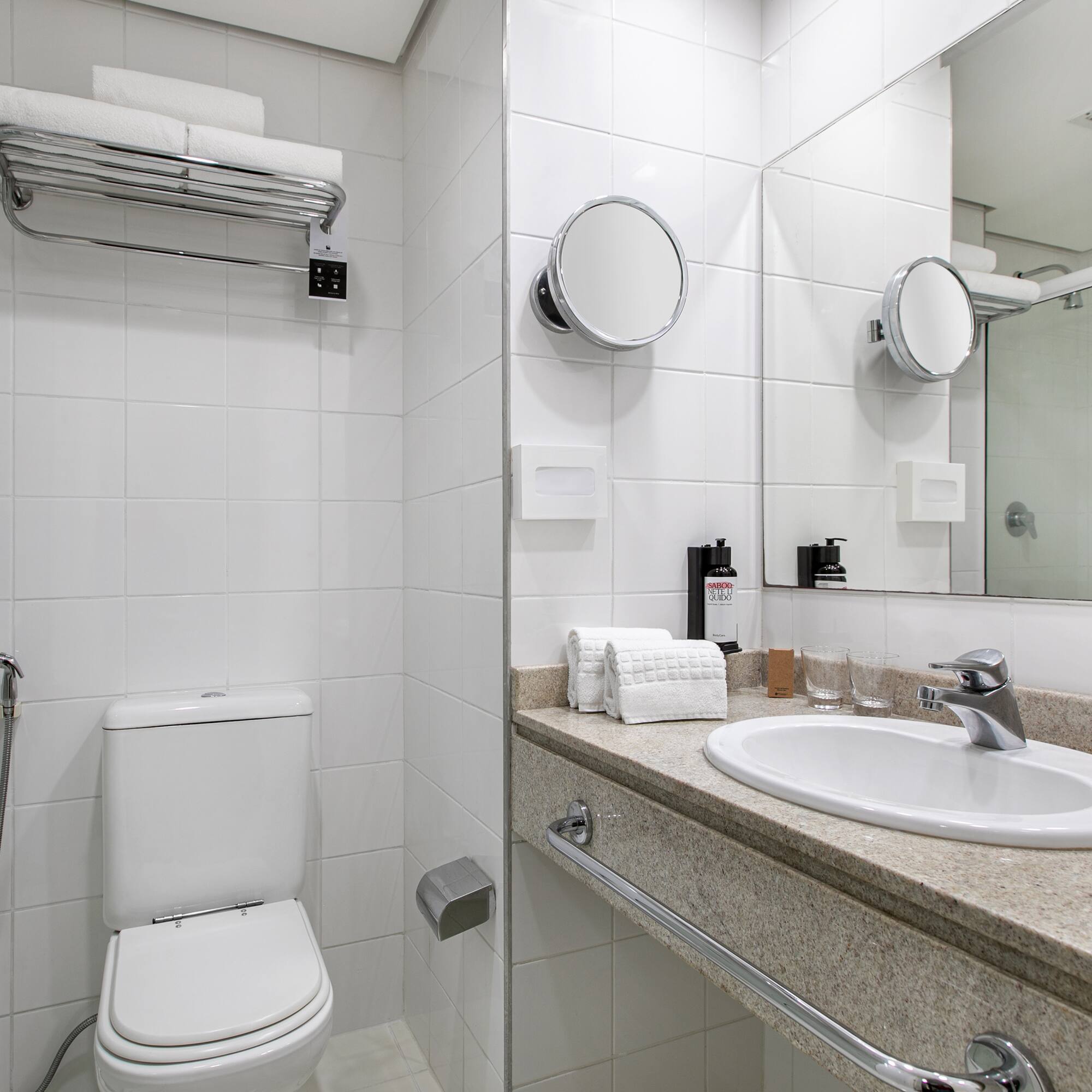 a bathroom with a sink and mirror