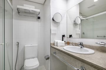 a bathroom with a sink and mirror