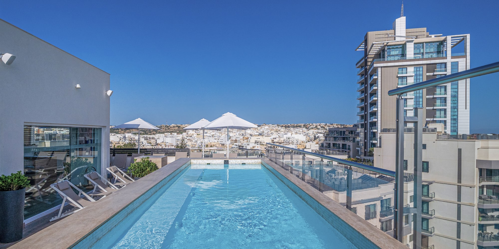 a swimming pool with a roof top