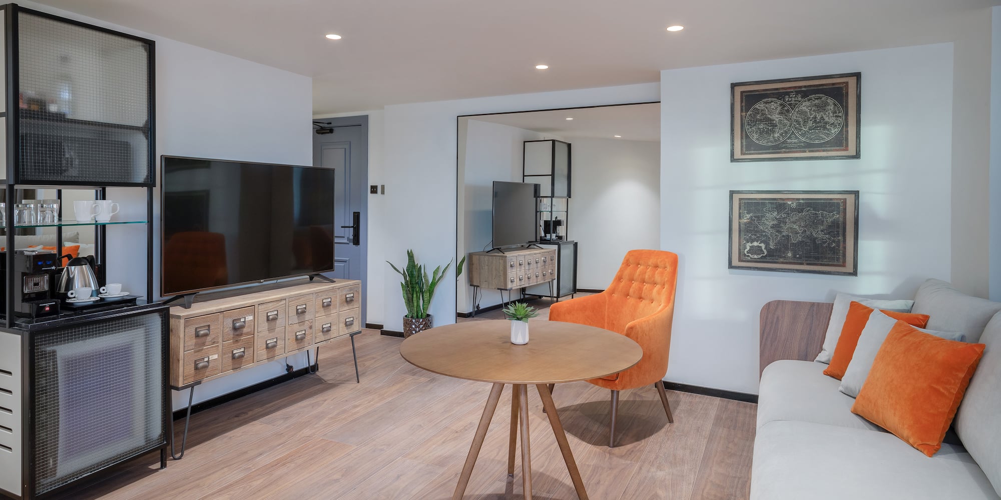 a room with a television and a chair