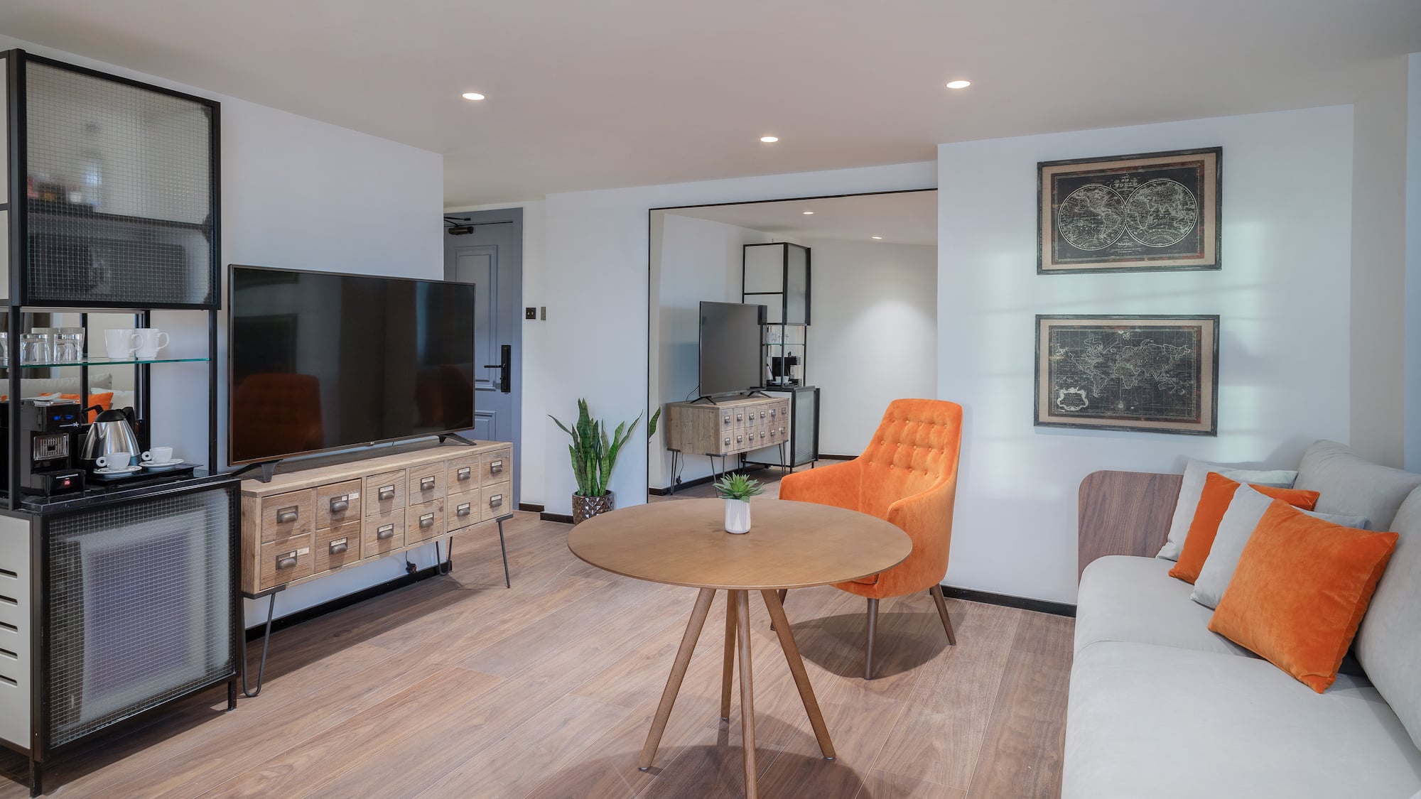 a room with a television and a chair