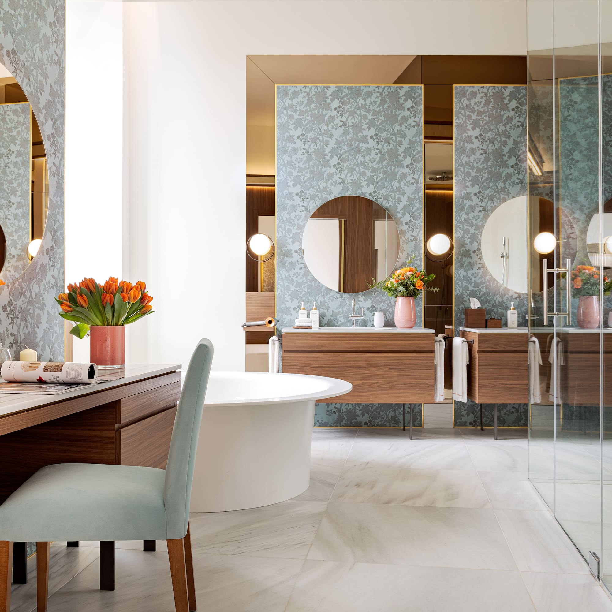 a bathroom with a tub and a mirror