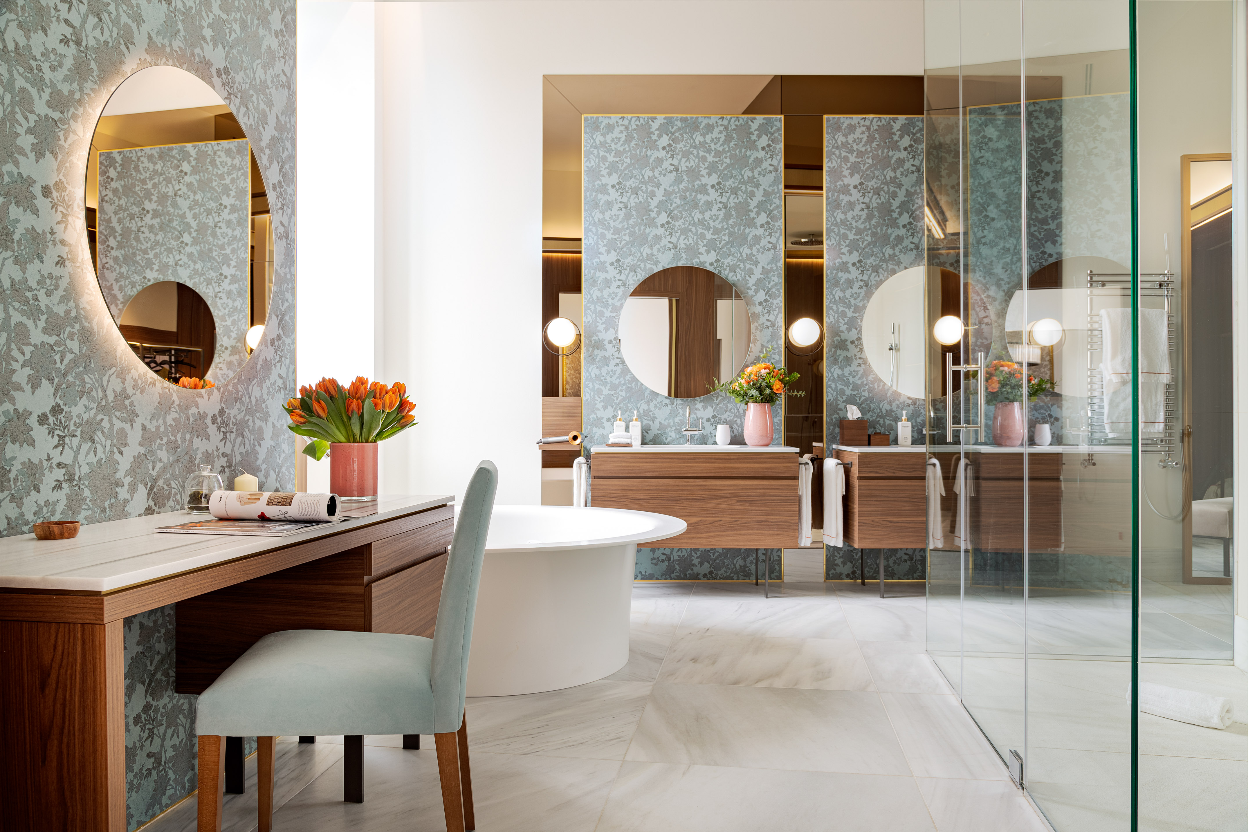 a bathroom with a tub and a mirror