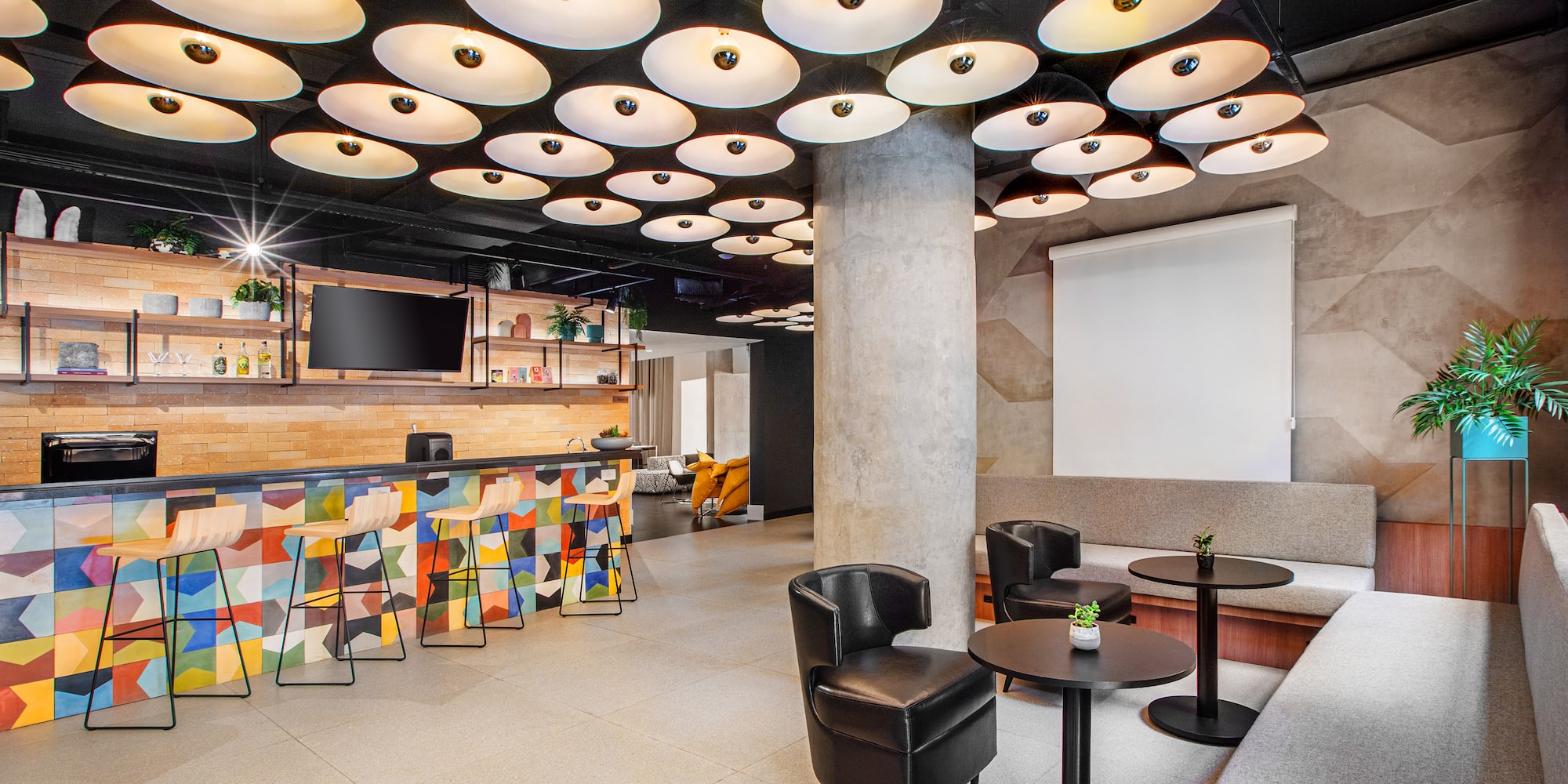 a room with a large ceiling and a large screen