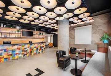 a room with a large ceiling and a large screen