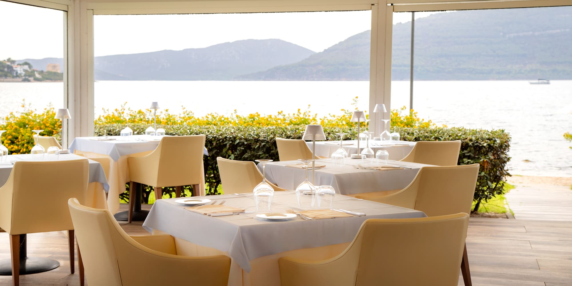 a restaurant with tables and chairs