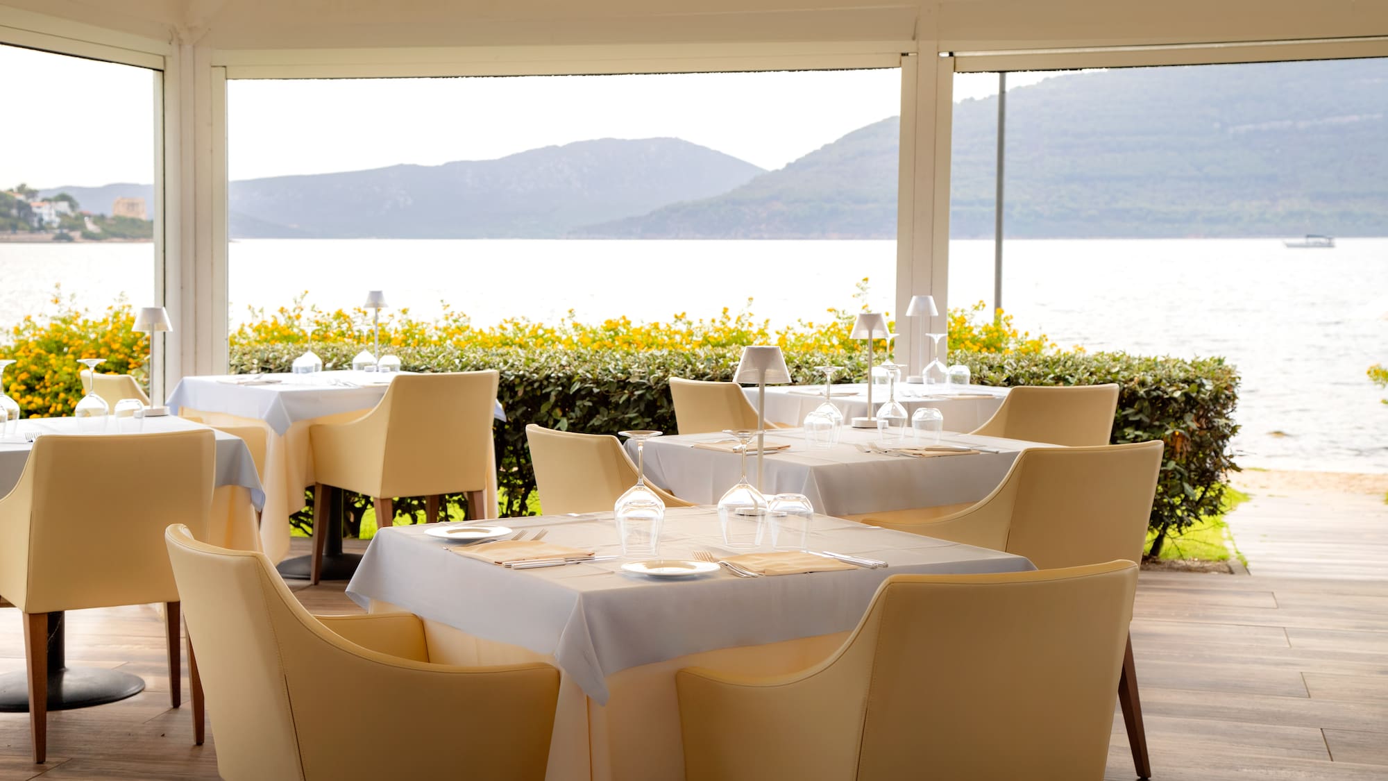 a restaurant with tables and chairs