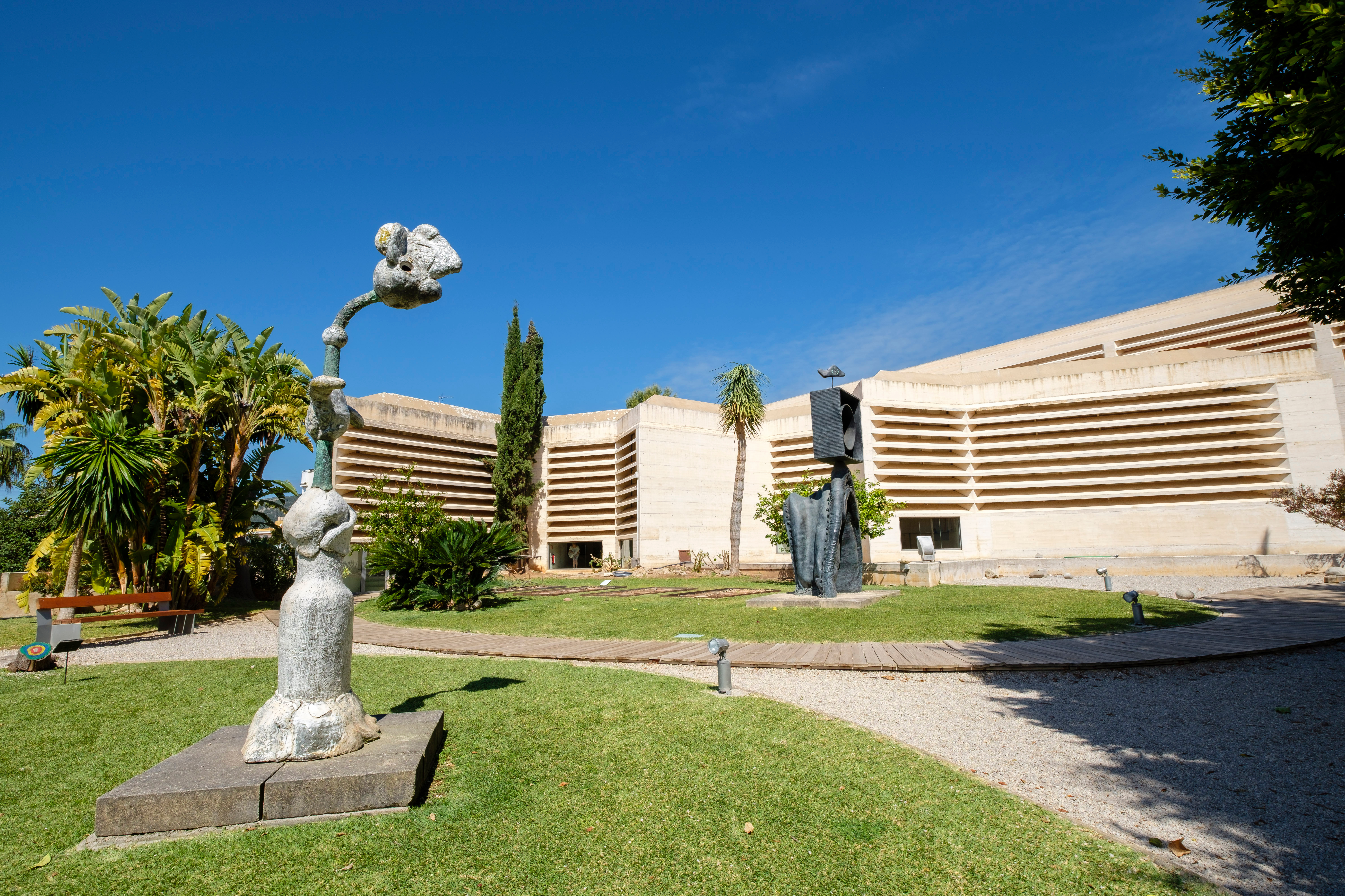 a statue in front of a building