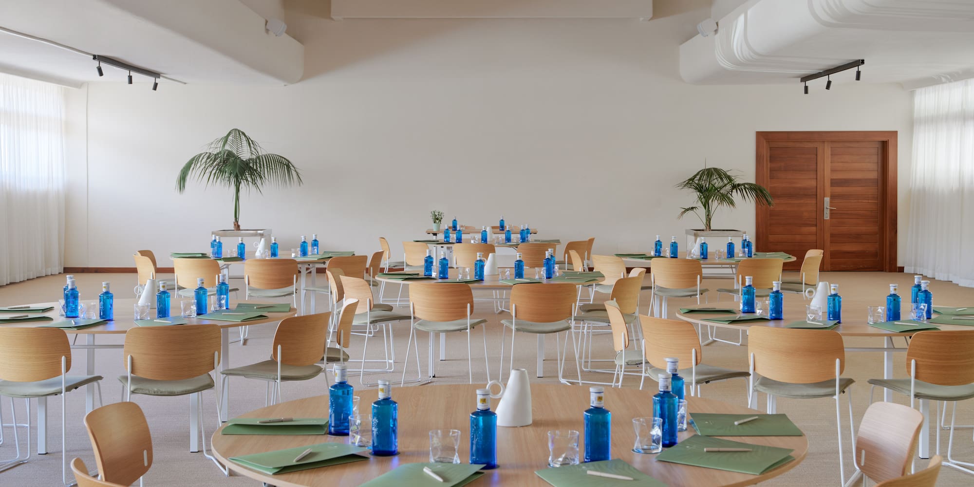 a room with tables and chairs