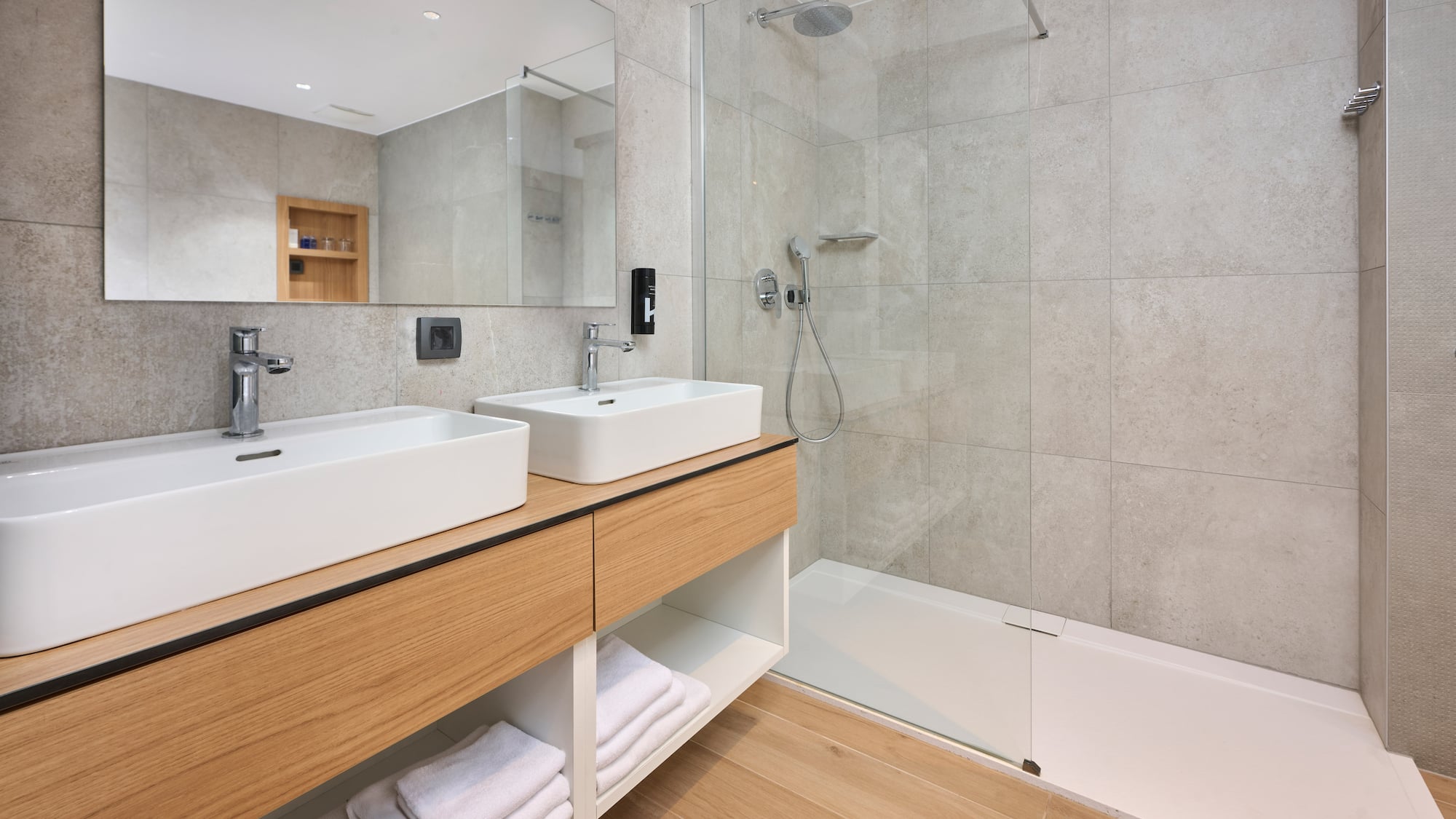 a bathroom with a shower and sink