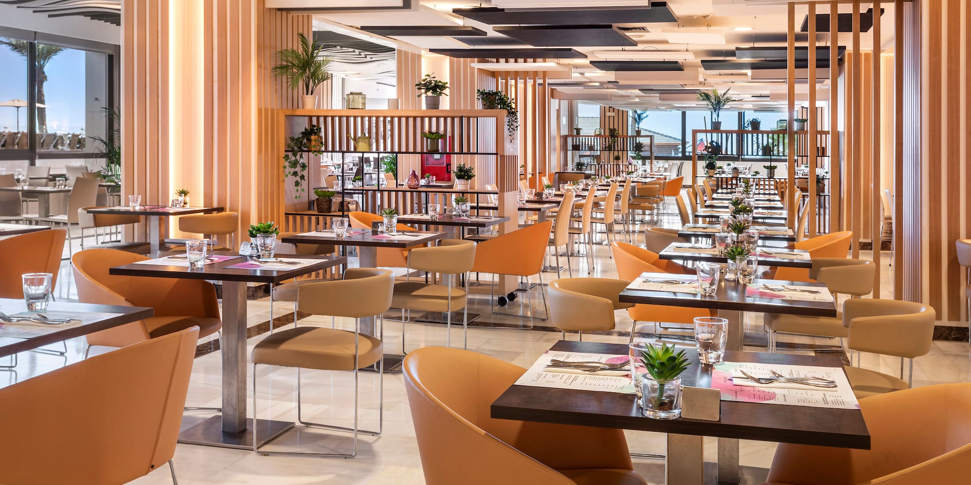 a room with tables and chairs