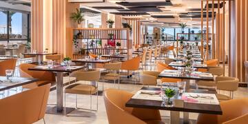 a room with tables and chairs