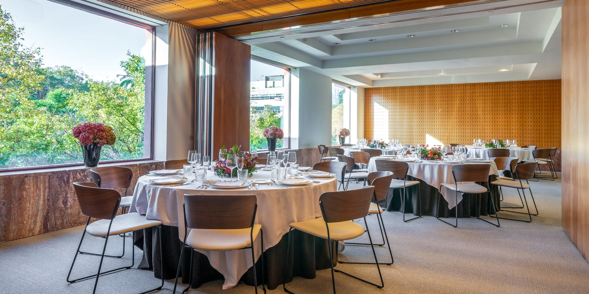 a room with tables and chairs