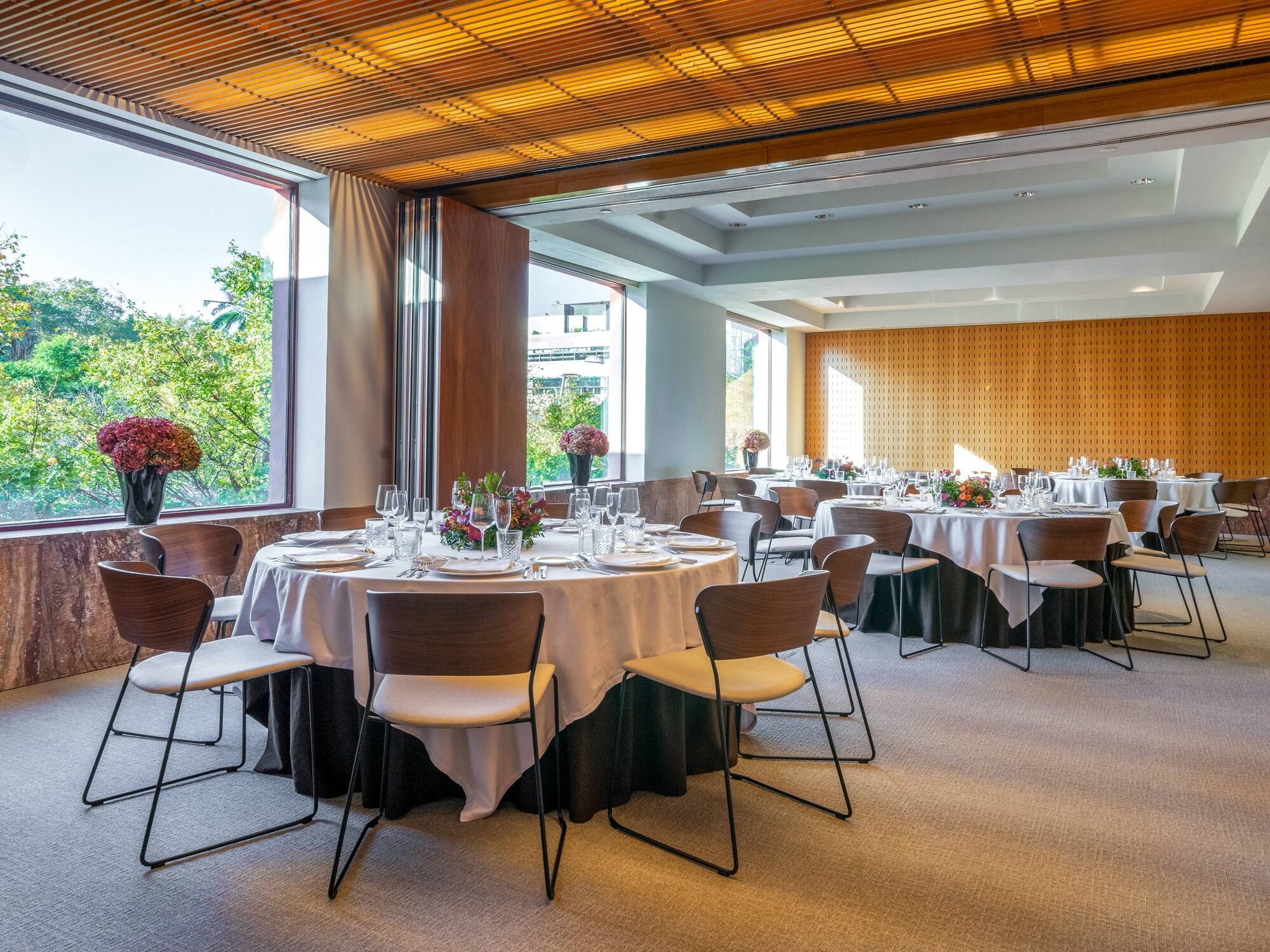 a room with tables and chairs